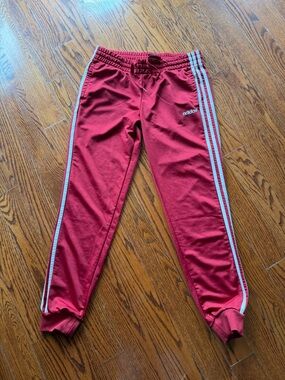 adidas burgundy Track Joggers with White Stripes